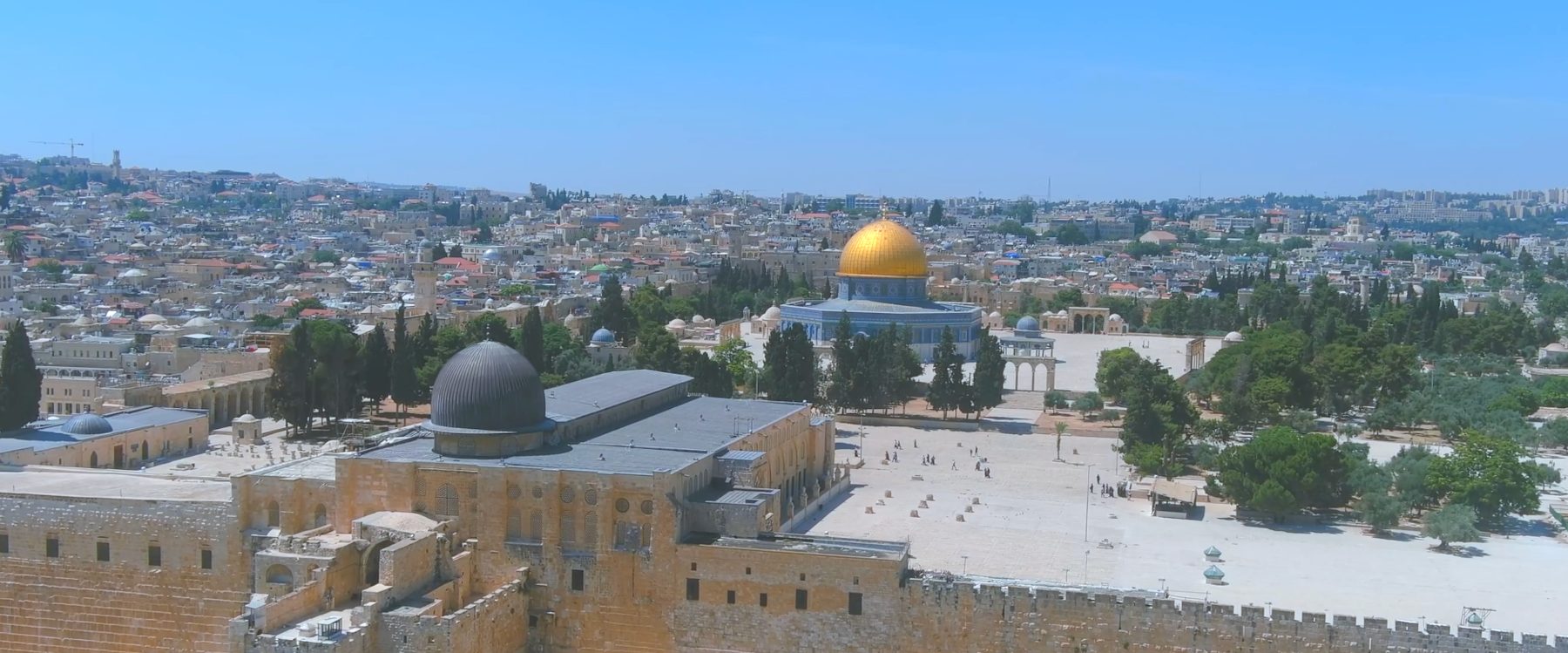 The Al Aqsa compound seen from above, the golden Dome of the Rock and the lead dome of the Qibli Mosque standing over the plaza